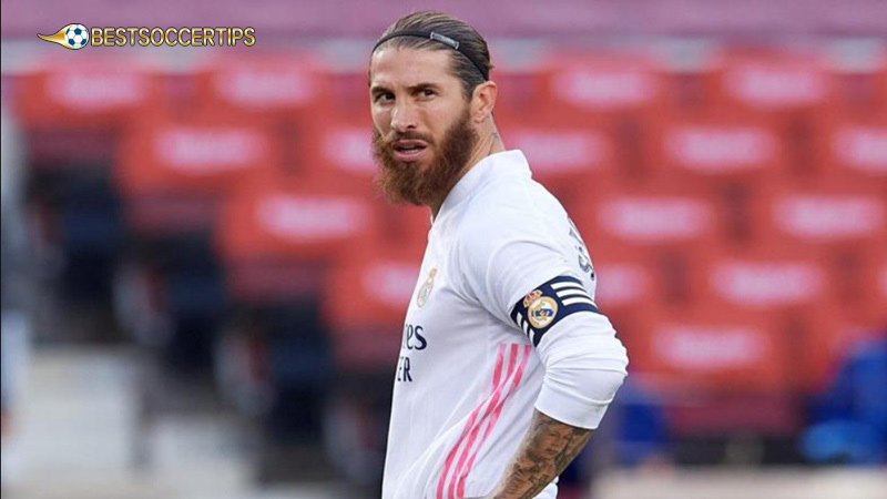 Soccer players with long hair and headband: Sergio Ramos