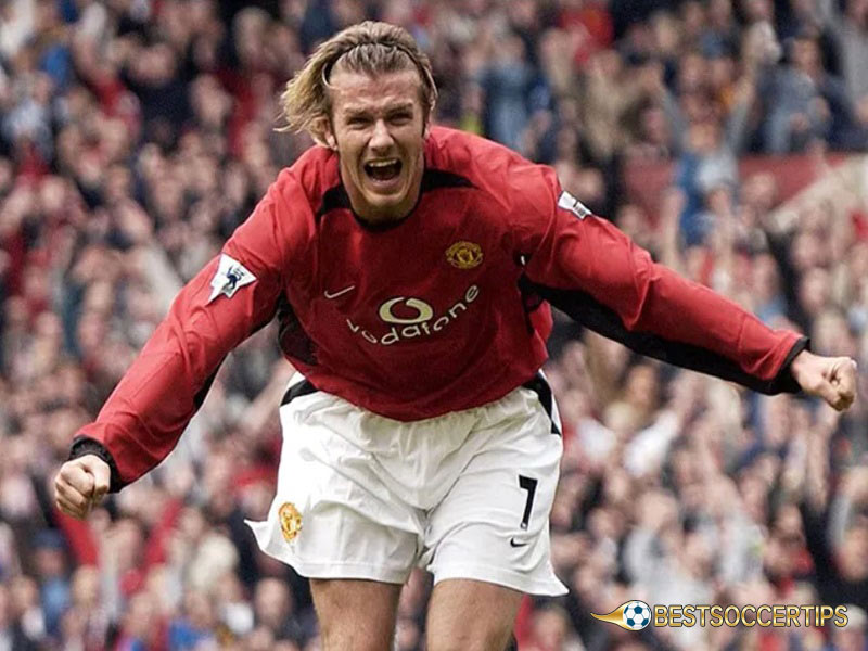 Soccer players with long hair and headband: David Beckham