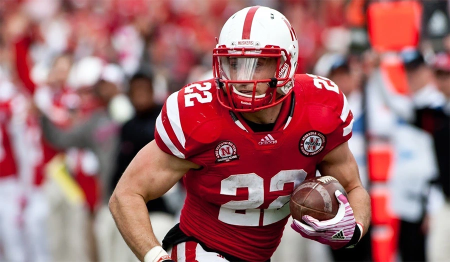 Rex Burkhead carrying the ball for Nebraska